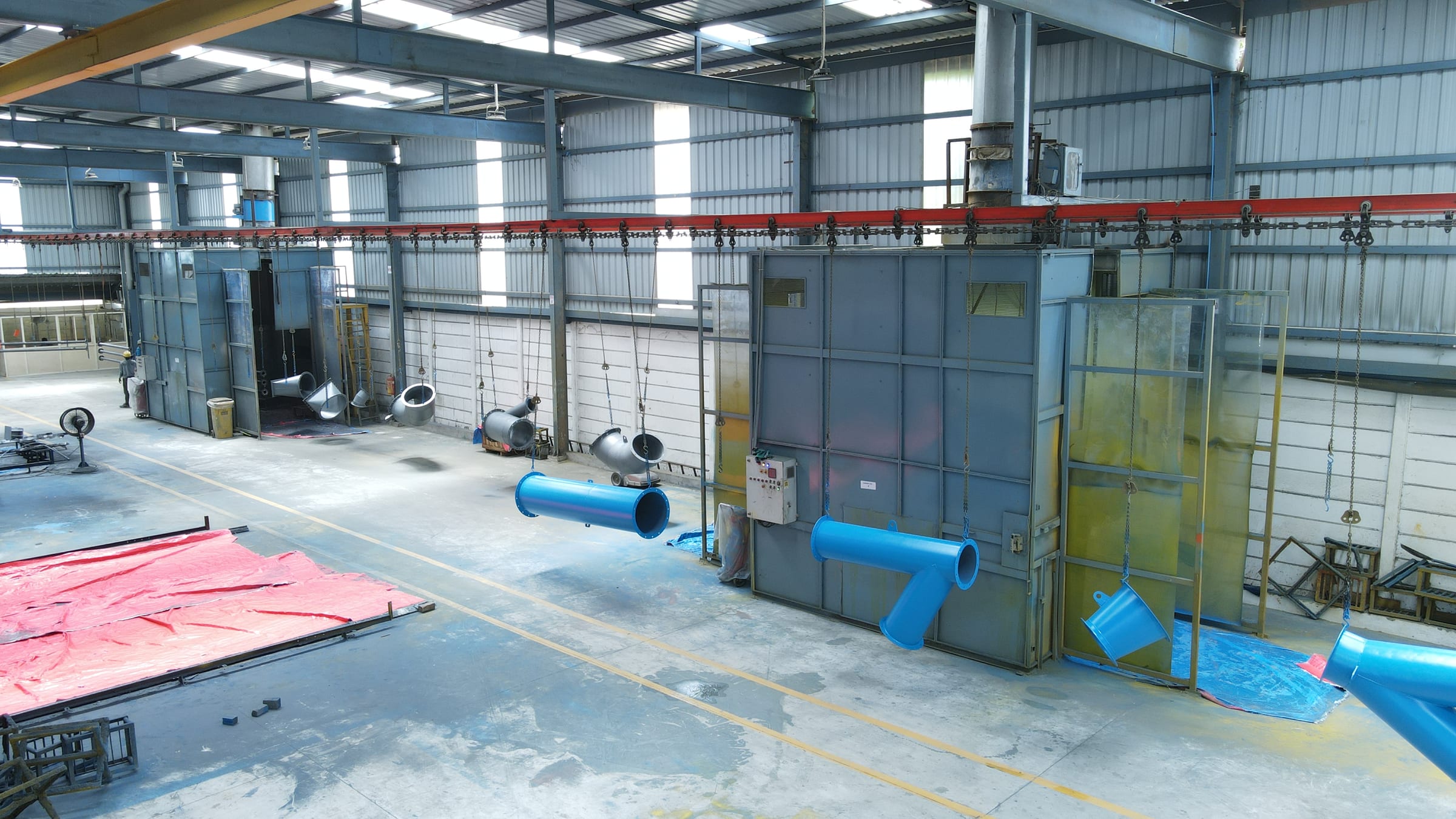 TECHFLOW conveyorized painting booths and overhead handling line